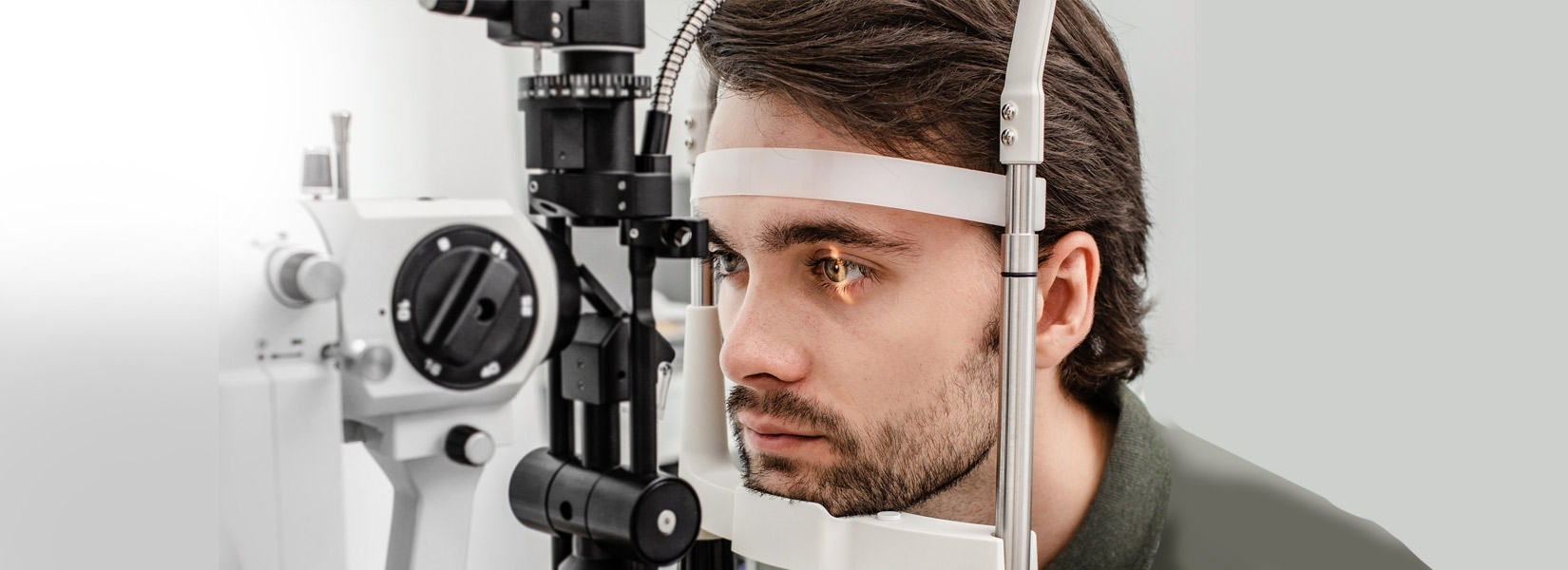 young man during eye exam in Concord